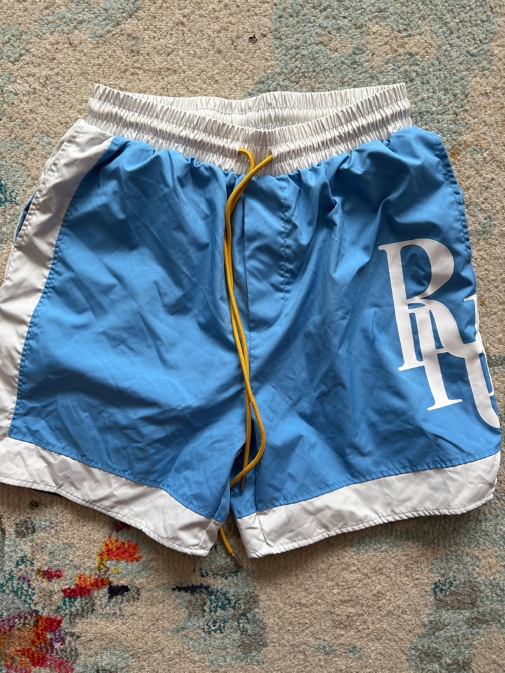 Rhude Light Blue and White Athletic Shorts with Yellow Drawstring